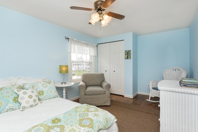 647 S Spinningwheel Ln, Michigan, MI 48304 - bedroom with baseboards, wood finished floors, a closet, and ceiling fan