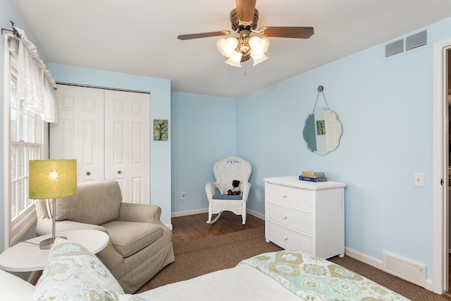647 S Spinningwheel Ln, Michigan, MI 48304 - bedroom featuring a closet, baseboards, and ceiling fan