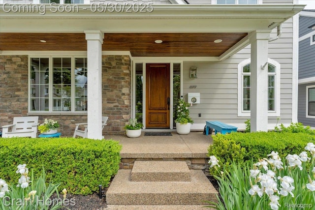 499 Catalpa Dr, Birmingham, MI 48009 - property entrance featuring a porch and stone siding