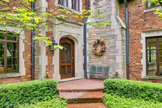 401 Dunston Rd, Bloomfield Hills, MI 48304 - view of exterior entry featuring brick siding
