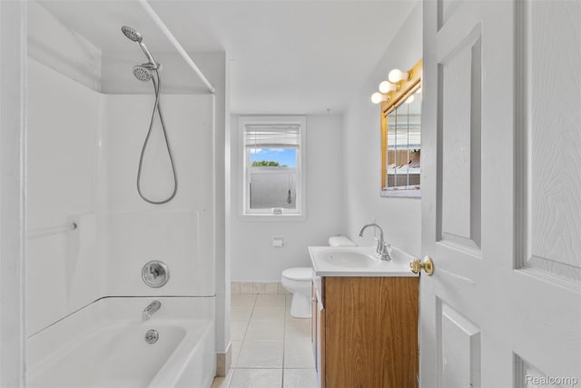 1914 10th St, Port Huron, MI 48060 - full bathroom with tile patterned flooring, vanity, shower / bathtub combination, toilet, and baseboards