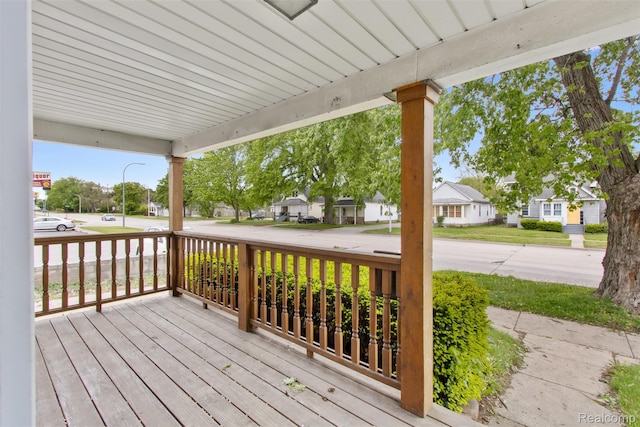 1914 10th St, Port Huron, MI 48060 - wooden porch featuring a residential view
