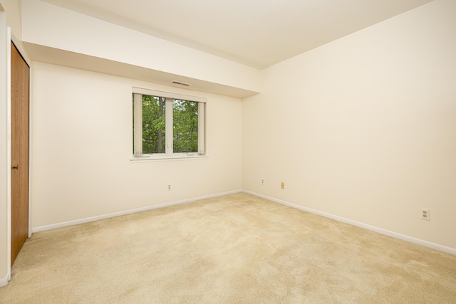 2125208 Nature Cove Ct, Ann Arbor, MI 48104 - empty room featuring light carpet and baseboards