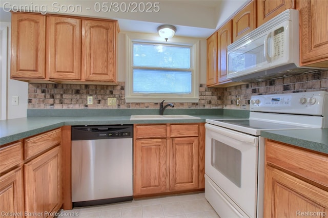 1468 N Morton Taylor Rd, Canton, MI 48187 - kitchen with white appliances, a sink, backsplash, light tile patterned floors, and dark countertops