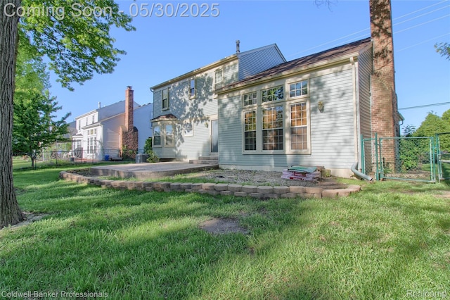 1468 N Morton Taylor Rd, Canton, MI 48187 - rear view of house featuring a chimney and a gate