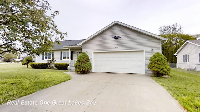 4984 Cactus Dr, Saginaw, MI 48603 - single story home featuring an attached garage and concrete driveway