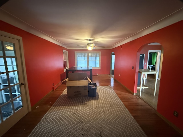 21338 Orchard Lake Rd, Farmington Hills, MI 48336 - corridor with arched walkways, wood finished floors, and baseboard heating