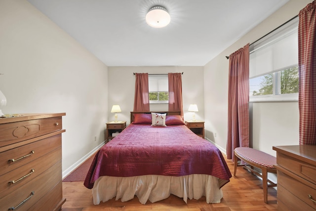 2074 Campbell Dr, Jackson, MI 49202 - bedroom with light wood-style floors and baseboards