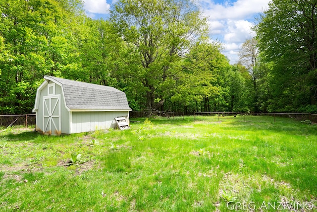 5906 Henry St, Norton Shores, MI 49441 - view of yard with a wooded view