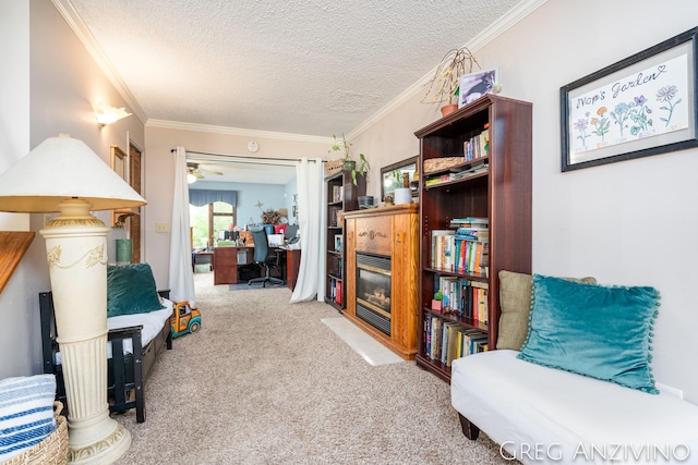 5906 Henry St, Norton Shores, MI 49441 - sitting room with carpet flooring, a fireplace with flush hearth, a textured ceiling, crown molding, and a desk