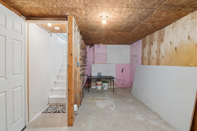 10200 Jerome Rd N, Jerome, MI 49249 - below grade area with wood walls and stairway