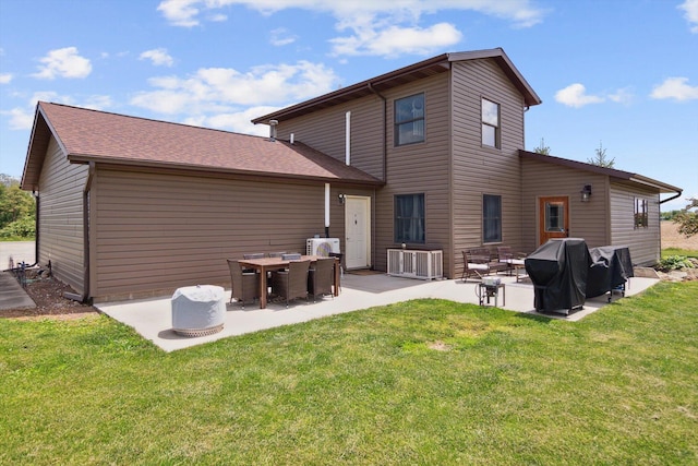 10200 Jerome Rd N, Jerome, MI 49249 - back of property featuring a patio, a yard, a cooling unit, and central AC unit