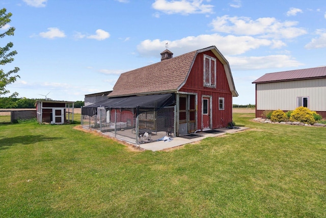 10200 Jerome Rd N, Jerome, MI 49249 - view of barn with a lawn