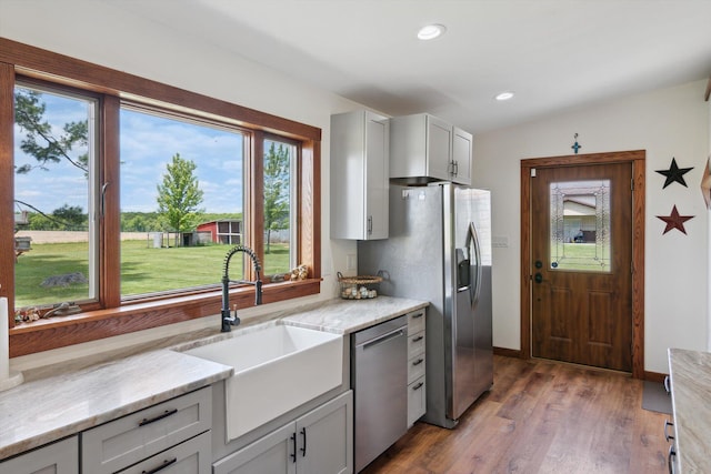 10200 Jerome Rd N, Jerome, MI 49249 - kitchen featuring stainless steel appliances, a sink, light wood-style floors, recessed lighting, and baseboards