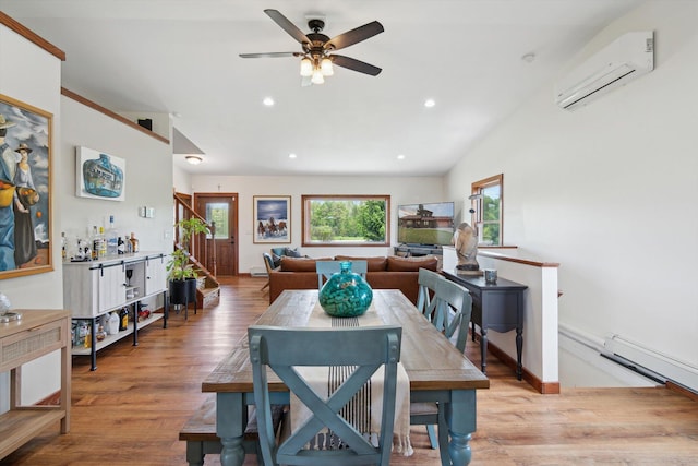 10200 Jerome Rd N, Jerome, MI 49249 - dining area featuring a wall unit AC, ceiling fan, wood finished floors, recessed lighting, and a baseboard radiator
