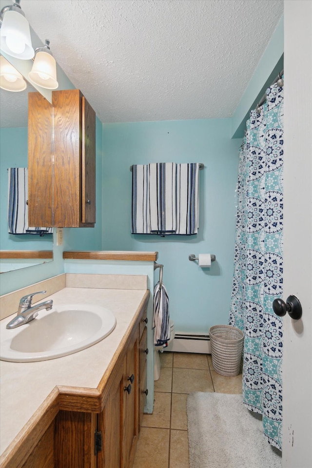 10200 Jerome Rd N, Jerome, MI 49249 - bathroom with vanity, a textured ceiling, tile patterned floors, a baseboard radiator, and a shower with shower curtain