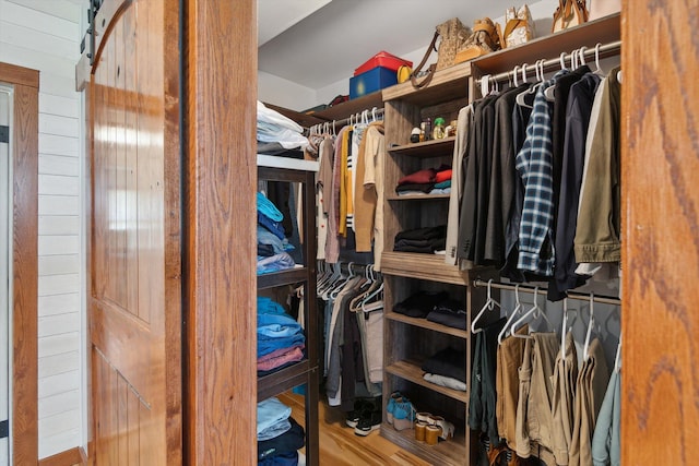 10200 Jerome Rd N, Jerome, MI 49249 - walk in closet with wood finished floors