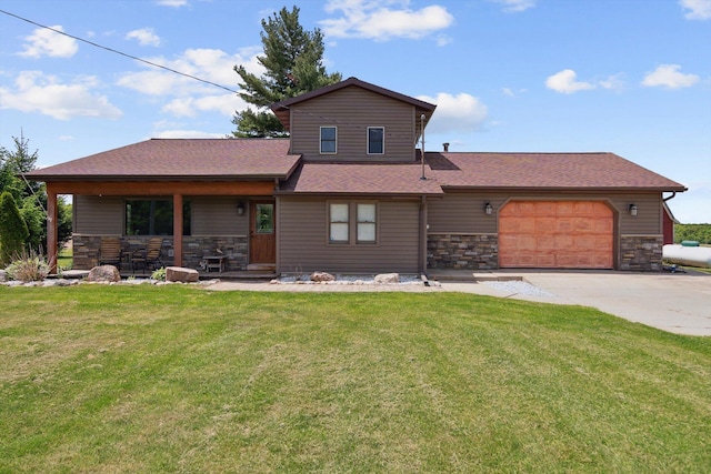 10200 Jerome Rd N, Jerome, MI 49249 - view of front of house featuring stone siding, driveway, a garage, and a front lawn
