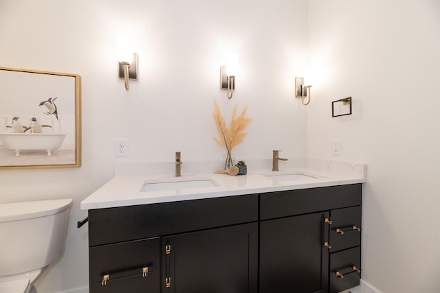 2750 Ashford Trl, Portage, MI 49024 - bathroom featuring toilet and double vanity