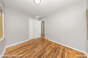 17167 Salem St, Detroit, MI 48219 - unfurnished bedroom with wood finished floors and baseboards