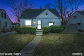 17167 Salem St, Detroit, MI 48219 - bungalow-style house with a chimney and a lawn