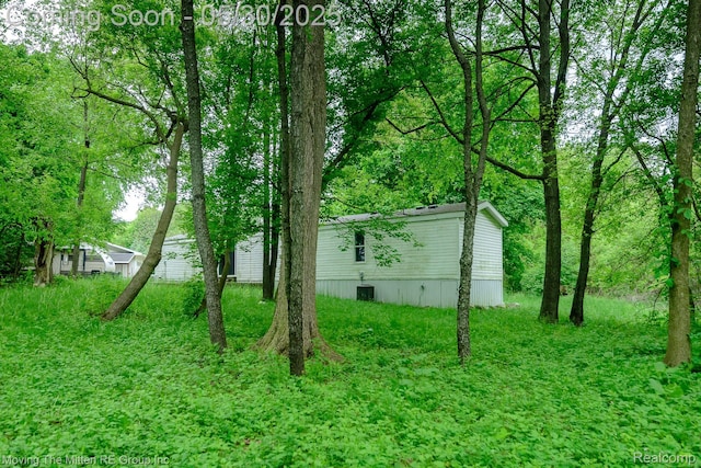 10531 Devils Lake Hwy, Addison, MI 49220 - view of yard featuring central air condition unit