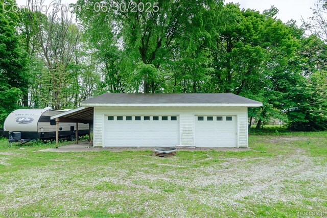 10531 Devils Lake Hwy, Addison, MI 49220 - garage featuring a detached garage