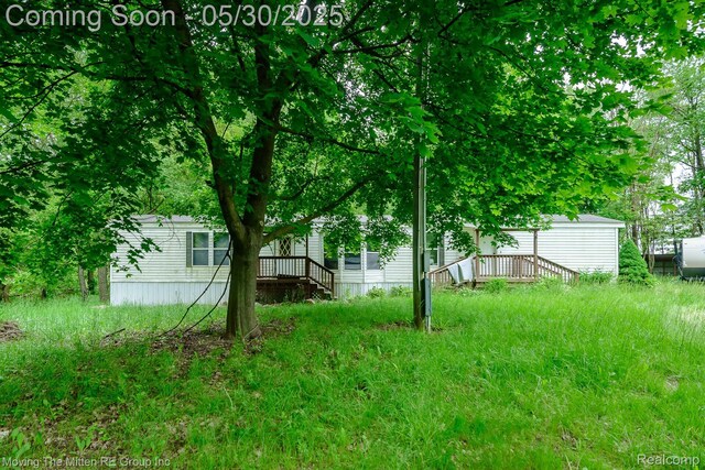 10531 Devils Lake Hwy, Addison, MI 49220 - view of yard featuring a deck
