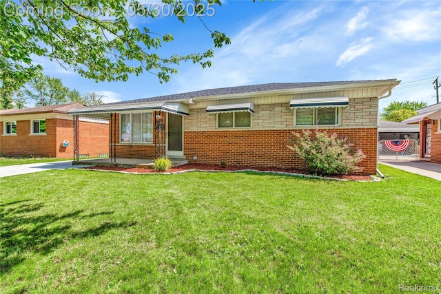 7278 Superior, Center Line, MI 48015 - view of front of property with a front yard, brick siding, and concrete driveway
