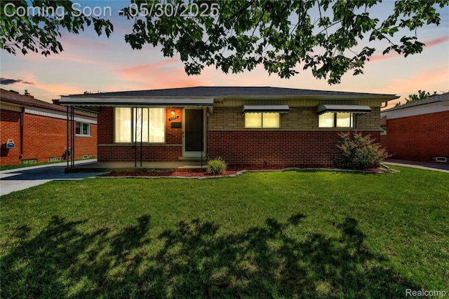 7278 Superior, Center Line, MI 48015 - view of front of property featuring a yard and brick siding