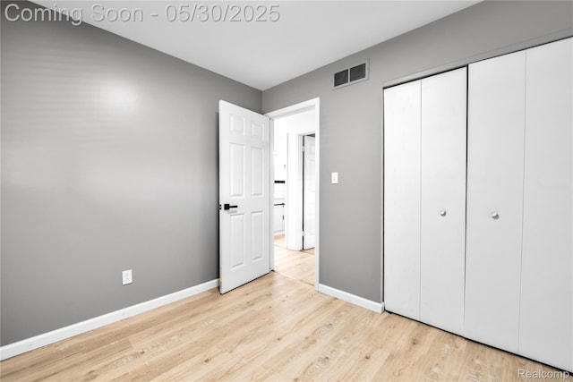 7278 Superior, Center Line, MI 48015 - unfurnished bedroom featuring baseboards, wood finished floors, and a closet
