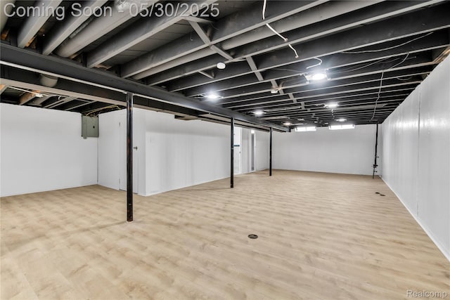 7278 Superior, Center Line, MI 48015 - below grade area with wood finished floors and electric panel