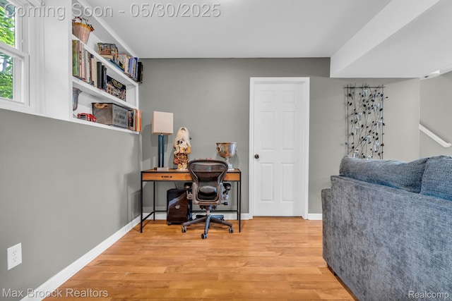 591 S Spinningwheel Ln, Bloomfield Hills, MI 48304 - office area featuring light wood-style flooring and baseboards