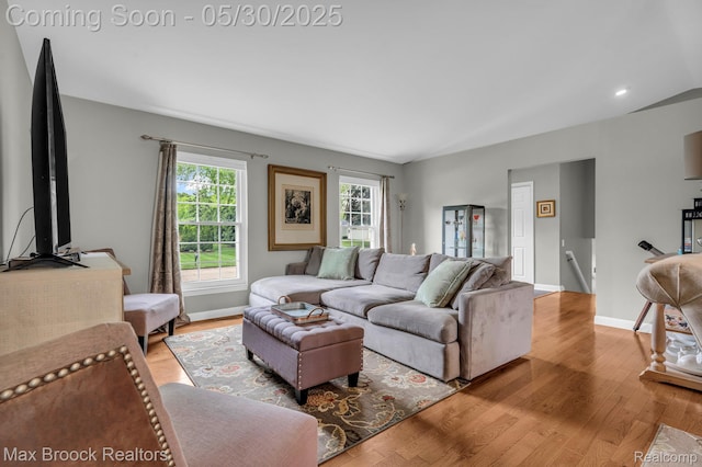 591 S Spinningwheel Ln, Bloomfield Hills, MI 48304 - living room featuring wood finished floors and baseboards