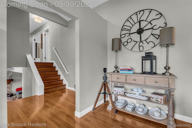 591 S Spinningwheel Ln, Bloomfield Hills, MI 48304 - stairway featuring wood finished floors and baseboards