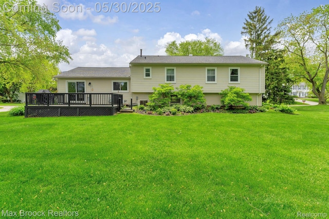 591 S Spinningwheel Ln, Bloomfield Hills, MI 48304 - back of house with a deck and a yard