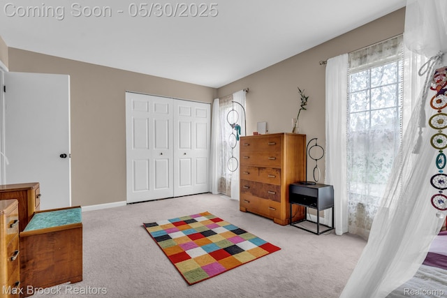 591 S Spinningwheel Ln, Bloomfield Hills, MI 48304 - bedroom with carpet flooring, a closet, and baseboards