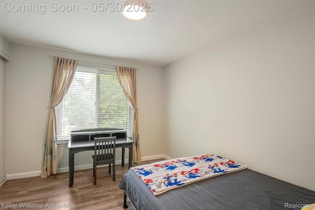 23355 Larkshire St, Farmington Hills, MI 48336 - bedroom featuring wood finished floors and baseboards