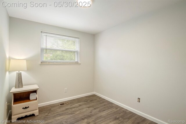 23355 Larkshire St, Farmington Hills, MI 48336 - spare room with wood finished floors and baseboards