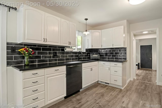 23355 Larkshire St, Farmington Hills, MI 48336 - kitchen featuring dishwasher, a sink, dark countertops, white cabinets, and light wood-style floors