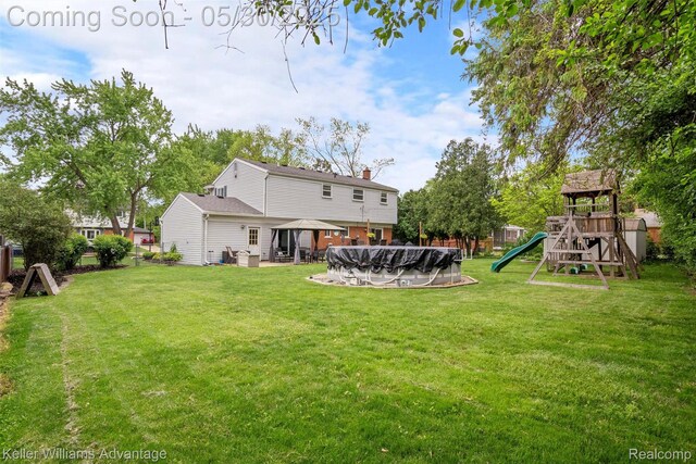 23355 Larkshire St, Farmington Hills, MI 48336 - view of yard with a gazebo and a playground