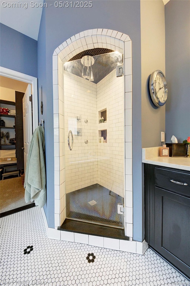 7730 Parkcrest Cir, Clarkston, MI 48348 - full bathroom featuring a shower stall, tile patterned flooring, and vanity