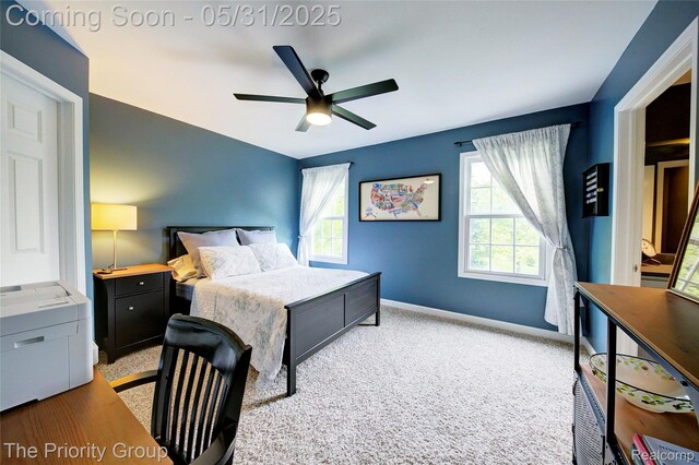 7730 Parkcrest Cir, Clarkston, MI 48348 - bedroom featuring carpet flooring, multiple windows, baseboards, and ceiling fan