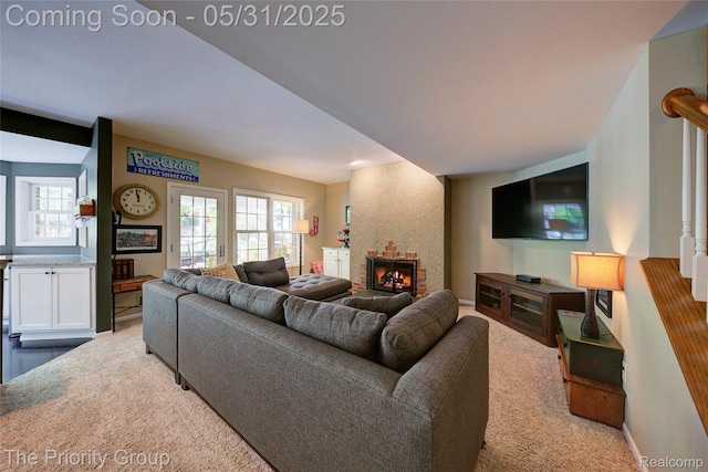 7730 Parkcrest Cir, Clarkston, MI 48348 - living room featuring carpet, healthy amount of natural light, and a fireplace