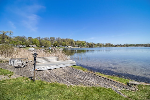 280 Rasmussen Dr, Trufant, MI 49347 - dock featuring a water view