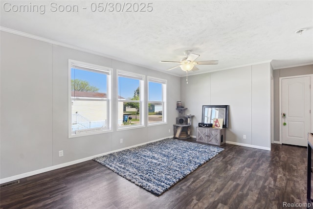 29 Fox Hound Ct, Grand Blanc, MI 48439 - living area featuring crown molding, wood finished floors, a ceiling fan, baseboards, and a textured ceiling