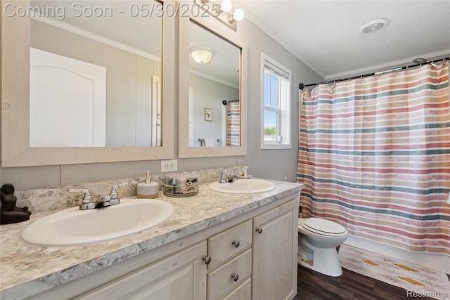 29 Fox Hound Ct, Grand Blanc, MI 48439 - full bath featuring crown molding, double vanity, toilet, wood finished floors, and a shower with shower curtain