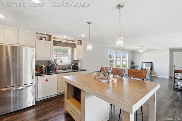 29 Fox Hound Ct, Grand Blanc, MI 48439 - kitchen featuring freestanding refrigerator, dishwasher, open shelves, dark wood-type flooring, and a sink