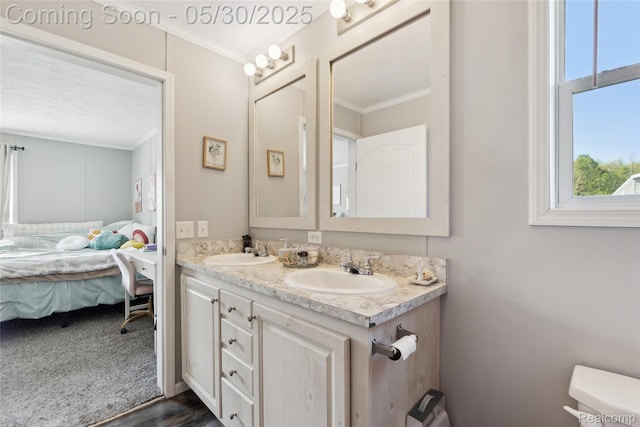 29 Fox Hound Ct, Grand Blanc, MI 48439 - full bath with crown molding, ensuite bathroom, double vanity, wood finished floors, and toilet