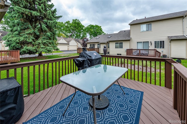 24511 Pinehurst Ave Unit 14, Oak Park, MI 48237 - deck with a yard, outdoor dining area, and a residential view